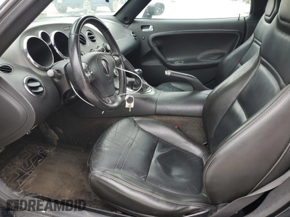 2008 Pontiac Solstice z VIN 1G2MB35B28Y108306, wystawiony jako Copart lot #51535025 z przebiegiem 79 099 mil mil oraz Szkoda całkowita • Salvage title. Historia ofert i sprzedaży dostępna na DreamBid. Obrazek 7.