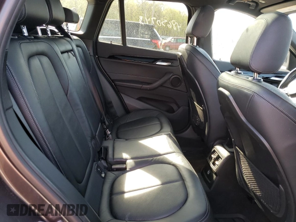 2018 BMW X1 xDrive28i with VIN WBXHT3C33J5K31838, listed as a Copart auction lot 48650943 with 63,064 mi miles and . Bid and sale history available at DreamBid. Image 11.