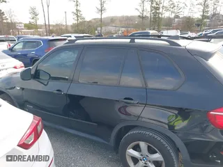 2011 BMW X5 35i with VIN 5UXZV4C58BL406373, listed as a IAAI auction lot 41715817 with 101,900 mi miles. Bid and sale history available at carsss.com. Image 14.