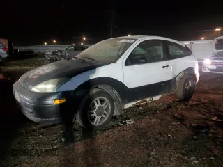 2000 Ford Focus ZX3 with VIN 3FAHP3137YR166185, listed as a Copart auction lot 82306114 with 148,254 mi miles and Salvage title. Bid and sale history available at DreamBid. Image 1.