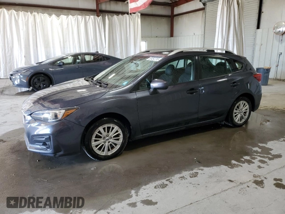 2017 Subaru Impreza Premium z VIN 4S3GTAB66H3711337, wystawiony jako Copart lot #53454715 z przebiegiem 131 102 mil mil oraz Szkoda całkowita • Salvage title. Historia ofert i sprzedaży dostępna na DreamBid. Obrazek 1.