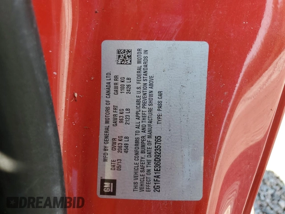 2013 Chevrolet Camaro LS z VIN 2G1FA1E36D9235765, wystawiony jako Copart lot #58519535 z przebiegiem 49 180 mil mil oraz Czysty tytuł • Clean title. Historia ofert i sprzedaży dostępna na DreamBid. Obrazek 13.