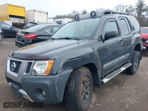 2014 Nissan Xterra X with VIN 5N1AN0NW5EN810488, listed as a IAAI auction lot 41705791 with 127,936 mi miles and . Bid and sale history available at DreamBid. Image 2.
