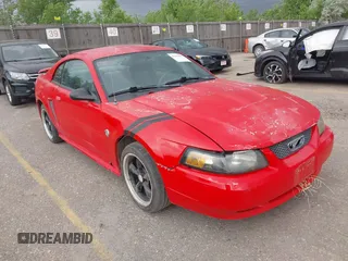 2004 Ford Mustang Standard z VIN 1FAFP40634F132986, wystawiony jako IAAI lot #42247835 z przebiegiem 160 081 mil mil oraz . Historia ofert i sprzedaży dostępna na DreamBid. Obrazek 1.