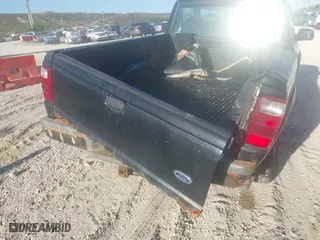 2003 Ford Ranger XL with VIN 1FTYR10U23PA44921, listed as a IAAI auction lot 41788023 with 128,034 mi miles. Bid and sale history available at carsss.com. Image 6.