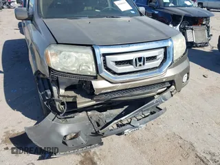 2010 Honda Pilot EX-L z VIN 5FNYF4H56AB001911, wystawiony jako IAAI lot #41806101 z przebiegiem 188 949 mil mil oraz . Historia ofert i sprzedaży dostępna na DreamBid. Obrazek 6.