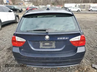 2006 BMW 3 Series 325xi with VIN WBAVT13556KW22517, listed as a Copart auction lot 43342125 with 113,636 mi miles and Salvage title. Bid and sale history available at DreamBid. Image 6.