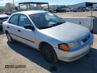 1998 Mazda Protege DX with VIN JM1BC1419W0195713, listed as a IAAI auction lot 41636718 with 203,287 mi miles and . Bid and sale history available at DreamBid. Image 1.