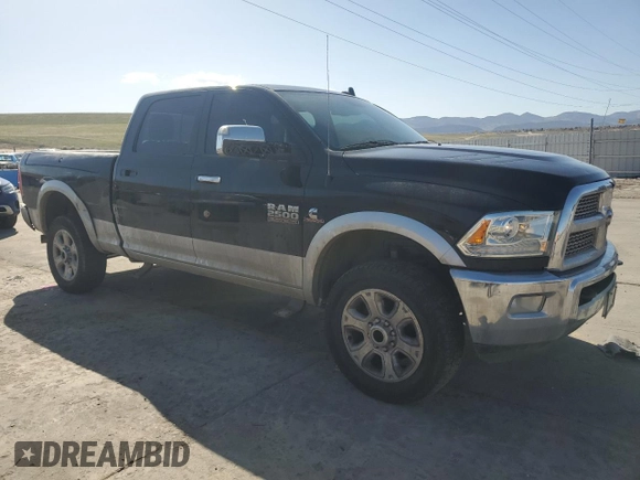 2014 Ram 2500 Laramie with VIN 3C6UR5FL2EG320582, listed as a Copart auction lot 52282625 with 216,745 mi miles and Salvage title. Bid and sale history available at DreamBid. Image 4.
