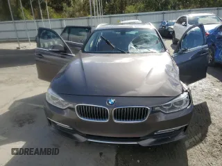2014 BMW 3 Series 328d xDrive with VIN WBA3K5C55EK300251, listed as a Copart auction lot 85226114 with 82,657 mi miles and Salvage title. Bid and sale history available at DreamBid. Image 11.