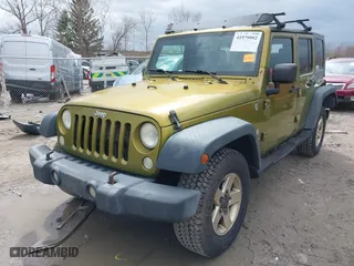 2008 Jeep Wrangler Unlimited X with VIN 1J4GA39158L529523, listed as a IAAI auction lot 41979992 with 304,641 mi miles. Bid and sale history available at carsss.com. Image 2.