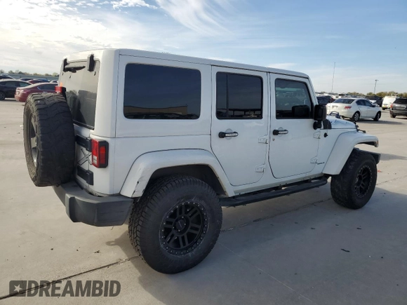 2015 Jeep Wrangler Unlimited Sahara with VIN 1C4BJWEG0FL649724, listed as a Copart auction lot 82189494 with 84,161 mi miles and Salvage Title. Bid and sale history available at carsss.com. Image 3.