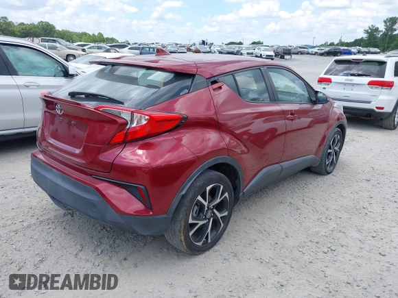 2018 Toyota C-HR XLE with VIN NMTKHMBX6JR054483, listed as a IAAI auction lot 42759739 with 89,820 mi miles and . Bid and sale history available at DreamBid. Image 4.