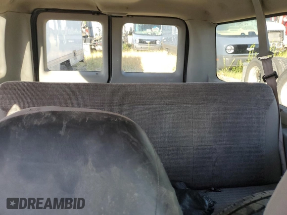 2000 Ford Econoline Passenger XL with VIN 1FMRE11L9YHB19715, listed as a Copart auction lot 69192734 with 237,129 mi miles and Salvage title. Bid and sale history available at DreamBid. Image 10.