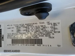 2012 Toyota Tacoma with VIN 5TFNX4CN3CX014129, listed as a Copart auction lot 48933205 with 122,112 mi miles and Salvage title. Bid and sale history available at DreamBid. Image 12.
