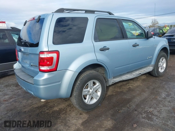 2009 Ford Escape Hybrid with VIN 1FMCU49309KB71172, listed as a IAAI auction lot 40971257 with 118,689 mi miles. Bid and sale history available at carsss.com. Image 4.