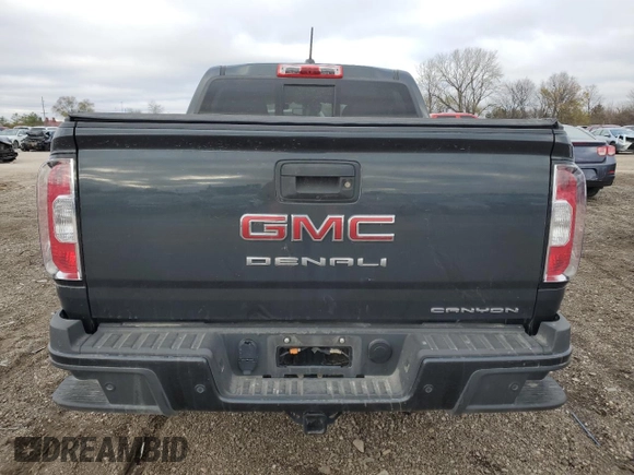 2021 GMC Canyon 4WD Denali with VIN 1GTG6EEN5M1213850, listed as a Copart auction lot 81138184 with 50,581 mi miles and Salvage Title. Bid and sale history available at carsss.com. Image 6.