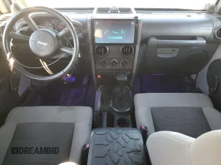 2008 Jeep Wrangler Unlimited X with VIN 1J4GB39138L517920, listed as a Copart auction lot 76541144 with 213,002 mi miles and Salvage Title. Bid and sale history available at DreamBid. Image 8.