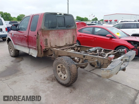 2003 Ford F-150 XL with VIN 2FTPX18LX3CA89961, listed as a IAAI auction lot 41901357 with 199,708 mi miles. Bid and sale history available at carsss.com. Image 3.