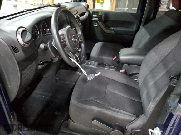 2013 Jeep Wrangler Sport with VIN 1C4AJWAG4DL501929, listed as a Copart auction lot 61940245 with 85,345 mi miles and Clean title. Bid and sale history available at DreamBid. Image 7.
