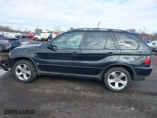 2006 BMW X5 4.4i with VIN 5UXFB53506LV22836, listed as a IAAI auction lot 41727708 with 186,084 mi miles. Bid and sale history available at carsss.com. Image 14.