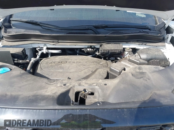 2023 Honda Passport Elite with VIN 5FNYF8H07PB010220, listed as a IAAI auction lot 41675730 with 25,128 mi miles and . Bid and sale history available at DreamBid. Image 10.