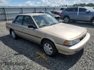 1991 Toyota Camry DLX z VIN 4T1SV21E5MU415356, wystawiony jako Copart lot #74465914 z przebiegiem 74 592 mil mil oraz Szkoda całkowita • Salvage title. Historia ofert i sprzedaży dostępna na DreamBid. Obrazek 4.