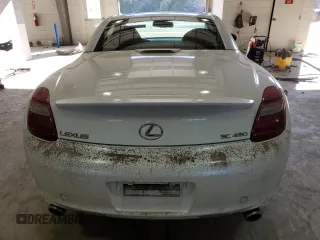 2007 Lexus SC 430 with VIN JTHFN45Y879012287, listed as a Copart auction lot 84038734 with 80,308 mi miles and Salvage Title. Bid and sale history available at DreamBid. Image 6.
