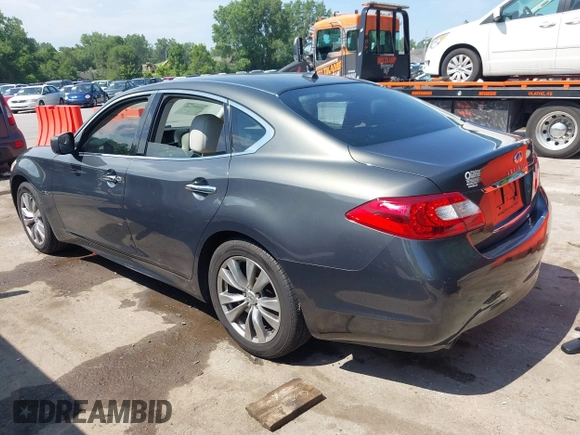2012 Infiniti M Hybrid with VIN JN1EY1AP4CM910962, listed as a IAAI auction lot 42597542 with 187,171 mi miles and . Bid and sale history available at DreamBid. Image 3.