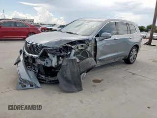 2024 Cadillac XT6 FWD Premium Luxury with VIN 1GYKPCRS7RZ704046, listed as a Copart auction lot 62534055 with 25,644 mi miles and Salvage title. Bid and sale history available at DreamBid. Image 1.