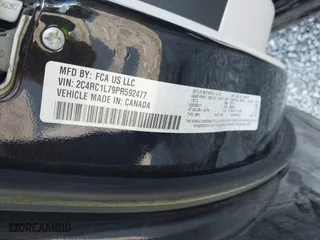 2023 Chrysler Pacifica Hybrid Touring L with VIN 2C4RC1L79PR592477, listed as a IAAI auction lot 40823333 with 8,729 mi miles. Bid and sale history available at carsss.com. Image 9.