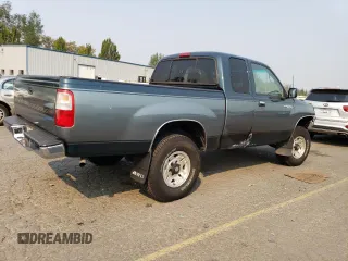 1996 Toyota T100 SR5 z VIN JT4UN24D3T0032313, wystawiony jako Copart lot #70693914 z przebiegiem 210 021 mil mil oraz Szkody całkowita. Historia ofert i sprzedaży dostępna na DreamBid. Obrazek 3.