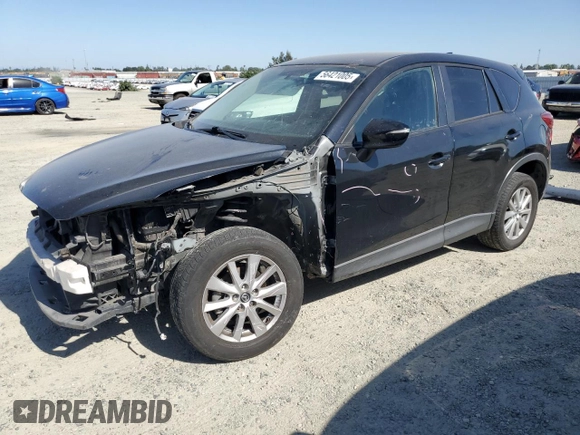2016 Mazda CX-5 Touring z VIN JM3KE2CY5G0617516, wystawiony jako Copart lot #56421005 z przebiegiem 110 739 mil mil oraz Szkoda całkowita • Salvage title. Historia ofert i sprzedaży dostępna na DreamBid. Obrazek 1.