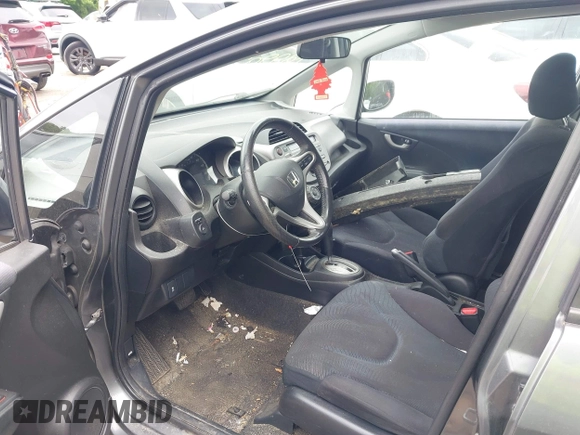 2011 Honda Fit Sport z VIN JHMGE8H53BS004872, wystawiony jako IAAI lot #42290323 z przebiegiem 145 685 mil mil oraz . Historia ofert i sprzedaży dostępna na DreamBid. Obrazek 5.