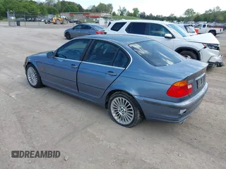 2001 BMW 3 Series 330i with VIN WBAAV53491JS94217, listed as a IAAI auction lot 42039234 with 128,977 mi miles. Bid and sale history available at carsss.com. Image 3.