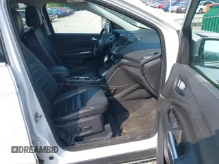2015 Ford Escape Titanium with VIN 1FMCU0JXXFUA07175, listed as a IAAI auction lot 42447067 with 94,893 mi miles and . Bid and sale history available at DreamBid. Image 5.