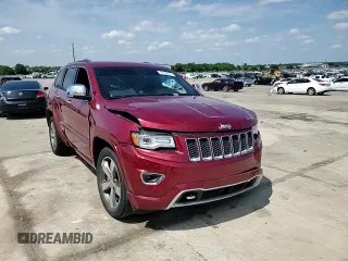 2015 Jeep Grand Cherokee Overland with VIN 1C4RJECG3FC686536, listed as a Copart auction lot 61058215 with 132,282 mi miles and Salvage title. Bid and sale history available at DreamBid. Image 13.