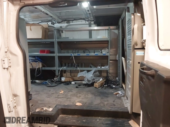 2015 Ford Transit Cargo with VIN 1FTNE1ZM7FKB29711, listed as a IAAI auction lot 41701438 with 169,200 mi miles. Bid and sale history available at carsss.com. Image 8.