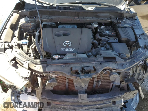 2017 Mazda CX-5 Touring z VIN JM3KFBCL4H0184922, wystawiony jako Copart lot #50166195 z przebiegiem 86 270 mil mil oraz Szkoda całkowita • Salvage title. Historia ofert i sprzedaży dostępna na DreamBid. Obrazek 11.