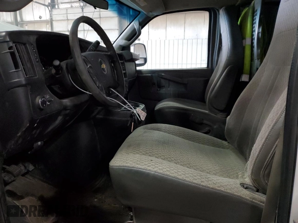 2016 Chevrolet Express Cargo with VIN 1GCWGAFF3G1290682, listed as a Copart auction lot 58050485 with 276,257 mi miles and Salvage title. Bid and sale history available at DreamBid. Image 7.