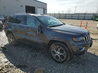 2018 Jeep Grand Cherokee Sterling Edition with VIN 1C4RJFBG0JC183384, listed as a Copart auction lot 51484935 with 87,873 mi miles and Non Repairable. Bid and sale history available at carsss.com. Image 4.