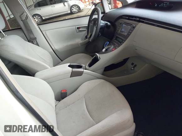 2015 Toyota Prius Four z VIN JTDKN3DU9F1889635, wystawiony jako IAAI lot #42189280 z przebiegiem 119 652 mil mil oraz . Historia ofert i sprzedaży dostępna na DreamBid. Obrazek 5.