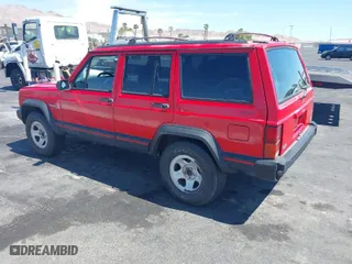 1995 Jeep Cherokee Sport with VIN 1J4FJ68SXSL572608, listed as a IAAI auction lot 42023846 with 167,342 mi miles. Bid and sale history available at carsss.com. Image 3.