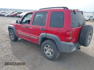 2002 Jeep Liberty Sport with VIN 1J4GL48K82W279730, listed as a IAAI auction lot 40903674 with 133,082 mi miles. Bid and sale history available at carsss.com. Image 3.
