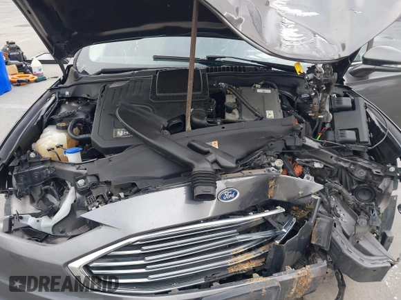 2018 Ford Fusion SE z VIN 3FA6P0LU8JR195096, wystawiony jako IAAI lot #41494088 z przebiegiem 114 007 mil mil oraz . Historia ofert i sprzedaży dostępna na DreamBid. Obrazek 10.