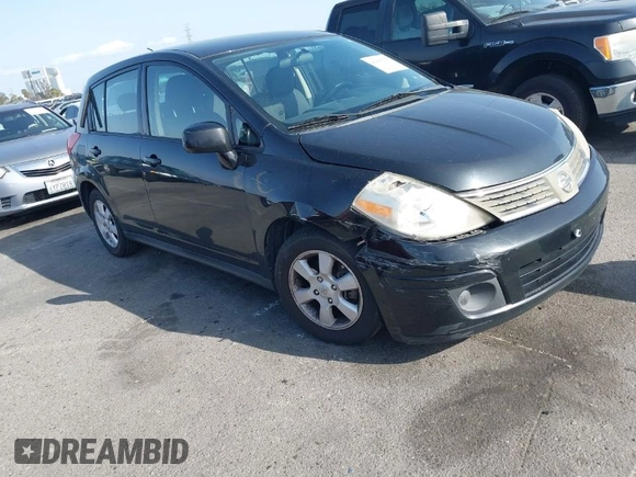 2009 Nissan Versa 1.8 SL with VIN 3N1BC13E79L406566, listed as a IAAI auction lot 41900375 with 109,470 mi miles. Bid and sale history available at carsss.com. Image 1.
