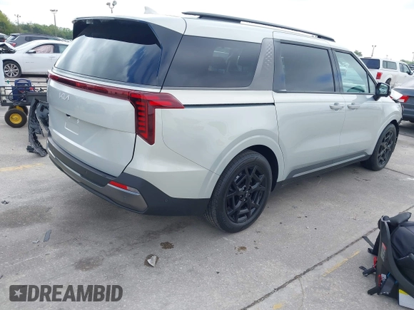 2025 Kia Carnival SX with VIN KNDNE5K38S6462298, listed as a IAAI auction lot 41913088 with 9,671 mi miles and . Bid and sale history available at carsss.com. Image 4.