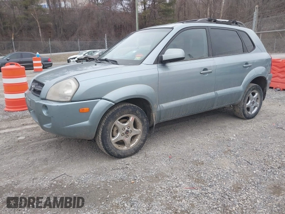 2007 Hyundai Tucson SE with VIN KM8JN12D27U606152, listed as a IAAI auction lot 41465051 with 141,478 mi miles. Bid and sale history available at carsss.com. Image 2.