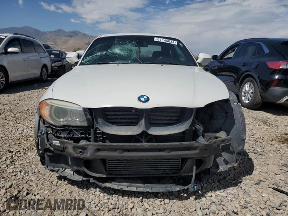 2012 BMW 1 Series 135i with VIN WBAUC9C52CVM12915, listed as a Copart auction lot 67145834 with 114,306 mi miles and Salvage title. Bid and sale history available at DreamBid. Image 5.