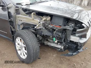 2015 Jeep Cherokee Latitude with VIN 1C4PJMCS9FW769294, listed as a IAAI auction lot 41810346 with 94,975 mi miles and . Bid and sale history available at DreamBid. Image 6.